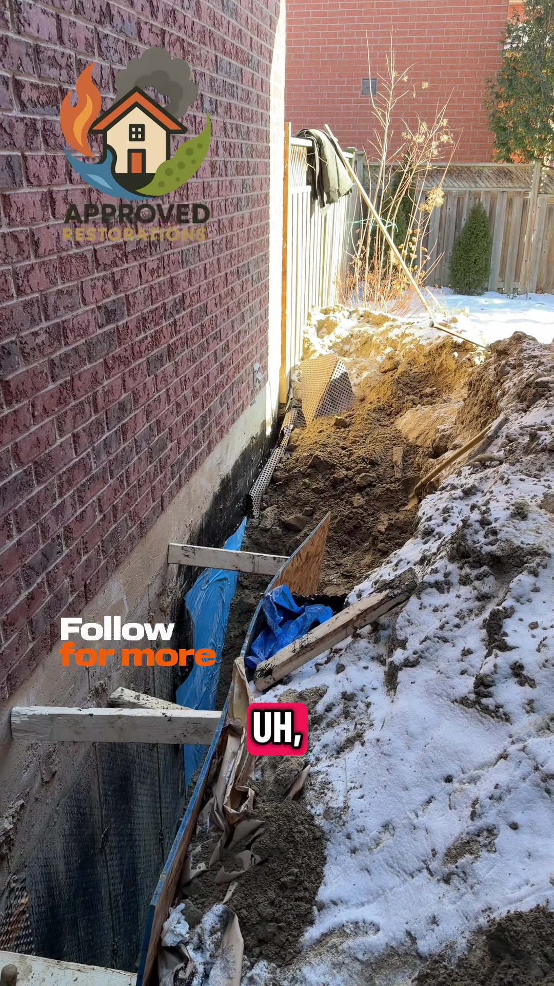 A giant foundation crack running all the way down the concrete is exactly where water has been leaking into this Thornhill home, so our crew is down in the snowy exterior trench stripping away the failed original membrane to apply fresh blue skin and seal every fissure along the entire wall.