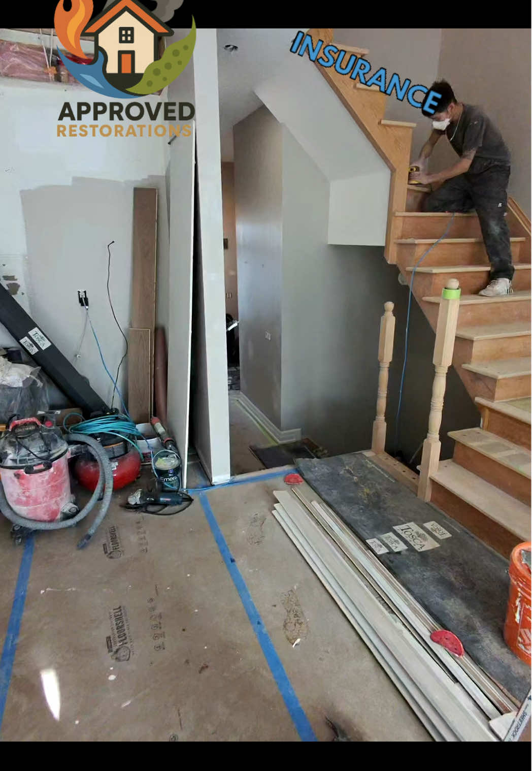 With the new hardwood completely installed after severe water damage tore through this Vaughan home, our crew is pushing through the final prep phase—sanding the stairs, laying fresh bathroom tile, and replacing the cut-out kitchen walls with double-layered, fire-rated drywall before the new cabinets arrive later today.