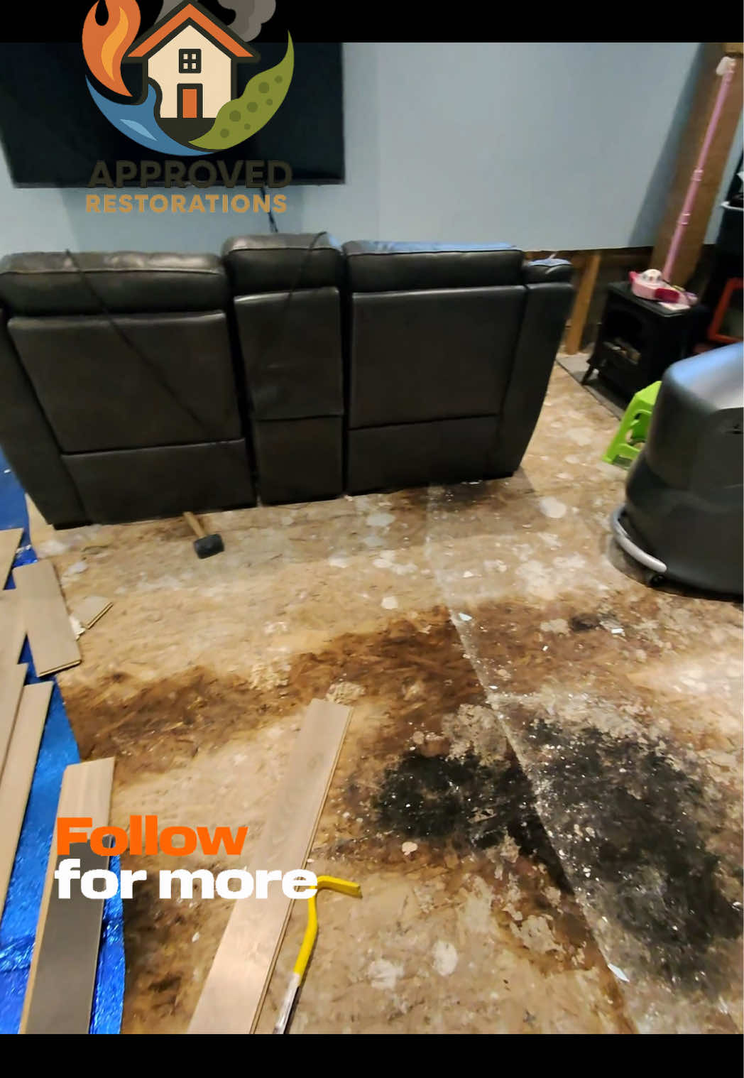 A sump-pump failure flooded this finished basement, and while the laminate surface seemed dry, trapped moisture underneath sparked widespread mold growth—so our crew is suiting up in full PPE to tear out the ruined flooring and cut the drywall up two feet to completely strip the contamination.