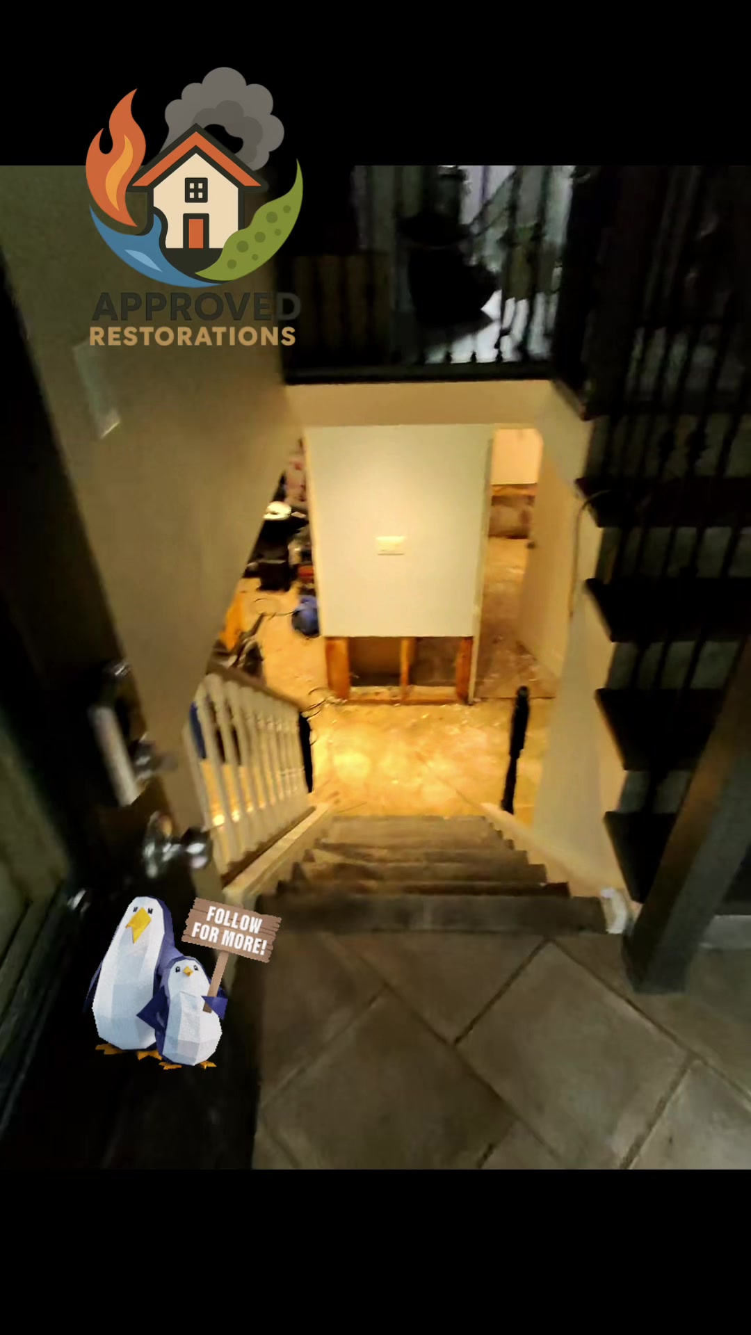 A sump pump failure flooded this basement and trapped hidden water beneath some highly questionable floor construction, so our crew executed extensive flood cuts to expose the saturated framing and is now wrapping up the final tear-down, running air movers to dry the bare concrete before we clean the space.