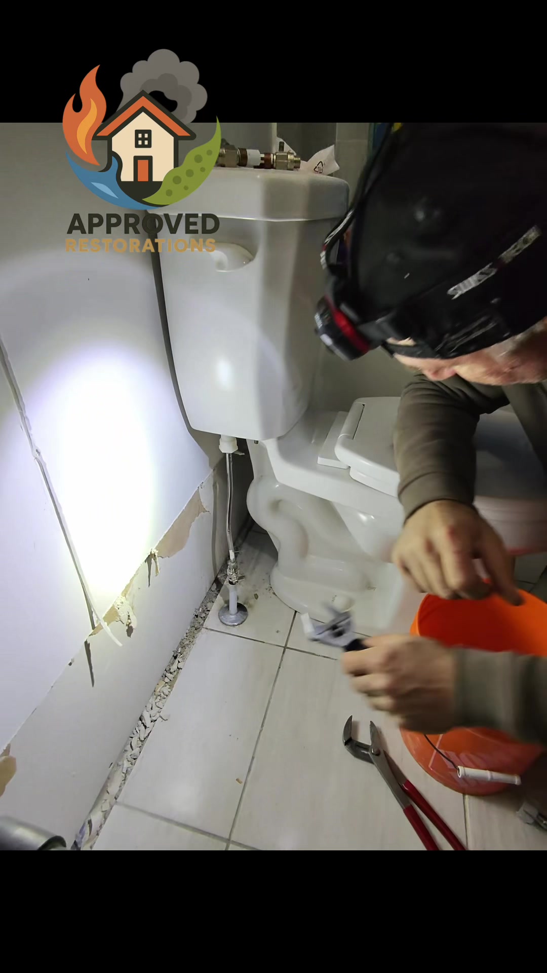 A rigid toilet supply line failed and flooded several areas of this home, so our team is swapping the breakable metal pipe for a flexible braided hose, tightening the new connection with pliers and testing the valve to ensure the leak is stopped before we begin the structural dry-out.