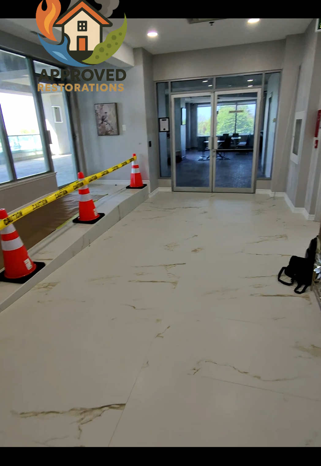 The condo residents loved our recent fourth-floor lobby renovation so much that they pushed the board to bring us back, so our crew is already ripping out the old gym flooring, hauling the debris out to our dump trailer, and prepping to lay the fresh tile stacked in the hallway.