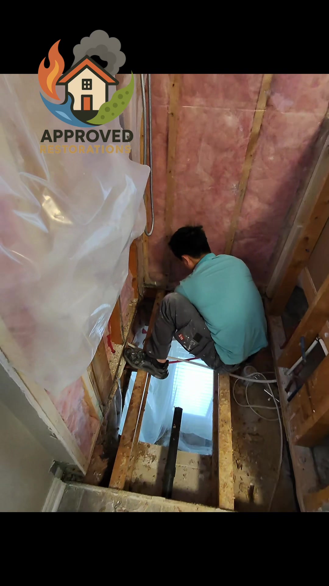 A severe shower leak completely compromised this bathroom's subfloor and the ceiling below, so our crew tore the enclosure down to the bare joists—leaving a clear drop to the lower level—and is now carefully inspecting the exposed framing to ensure every waterlogged board is hauled out before we start the rebuild.