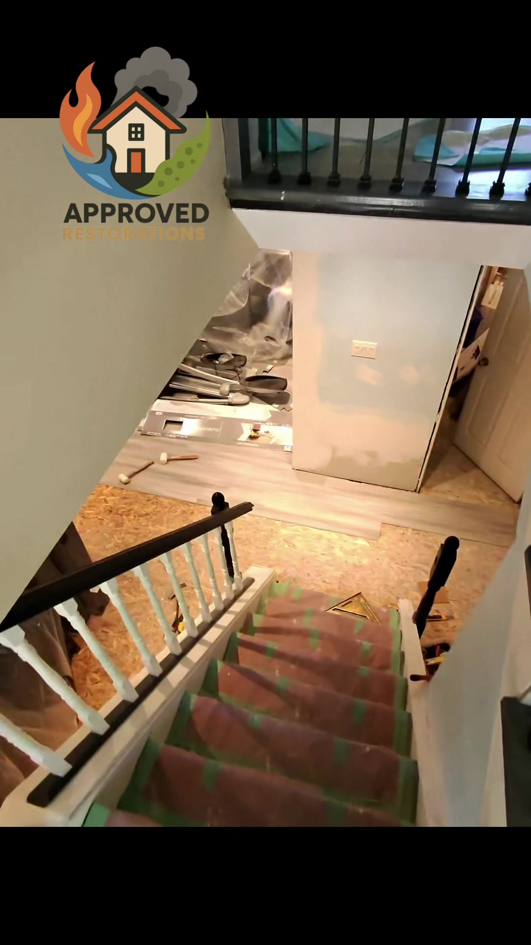 A sudden sump pump failure left this basement completely flooded, but after hauling out the soaked materials and drying the structure, our crew is officially in the rebuild phase—masking off the stairs to protect the home while we lock fresh laminate planks into place and prep the newly mudded drywall for paint.
